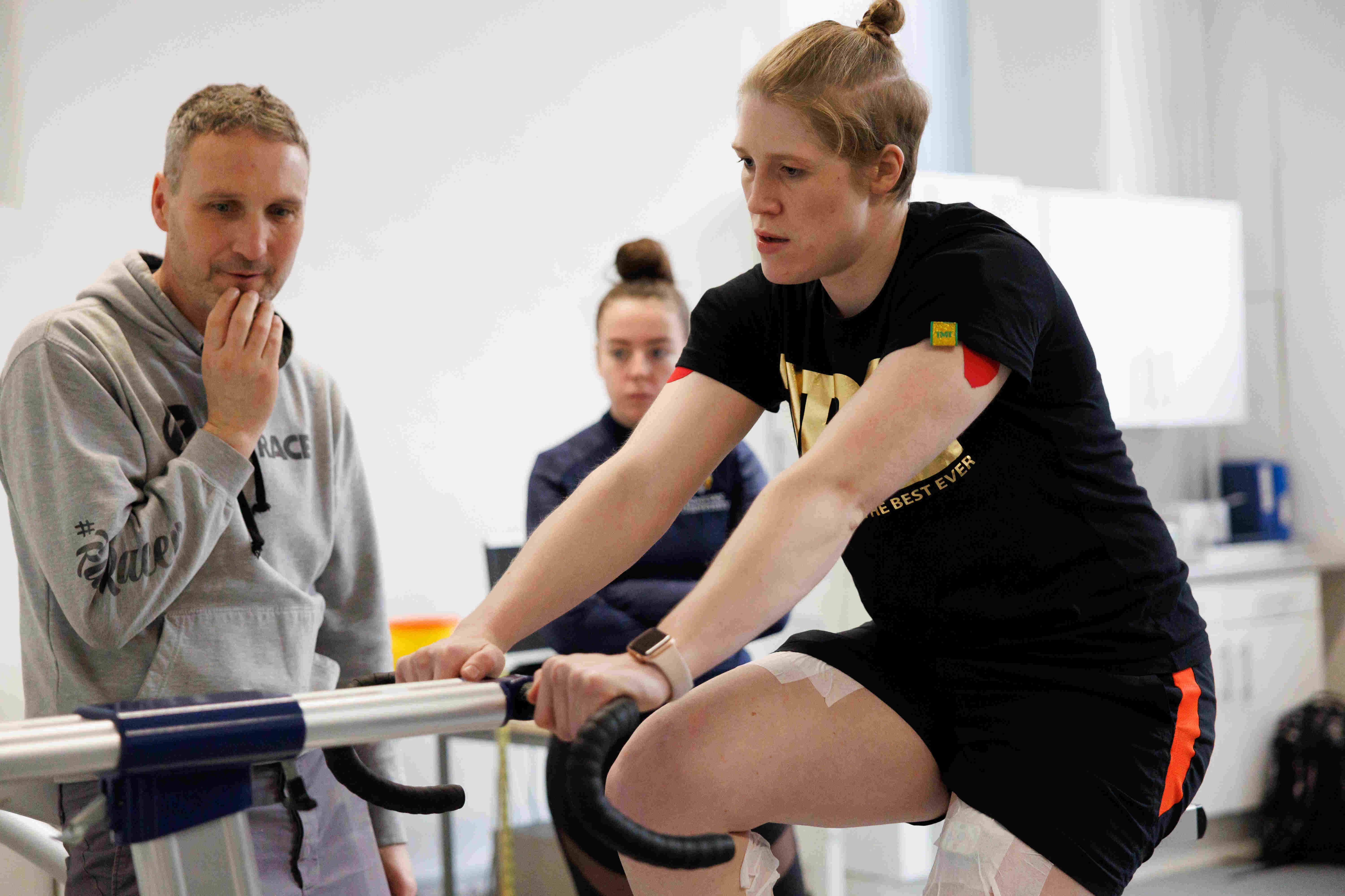 Hannah Rankin on an exercise bike