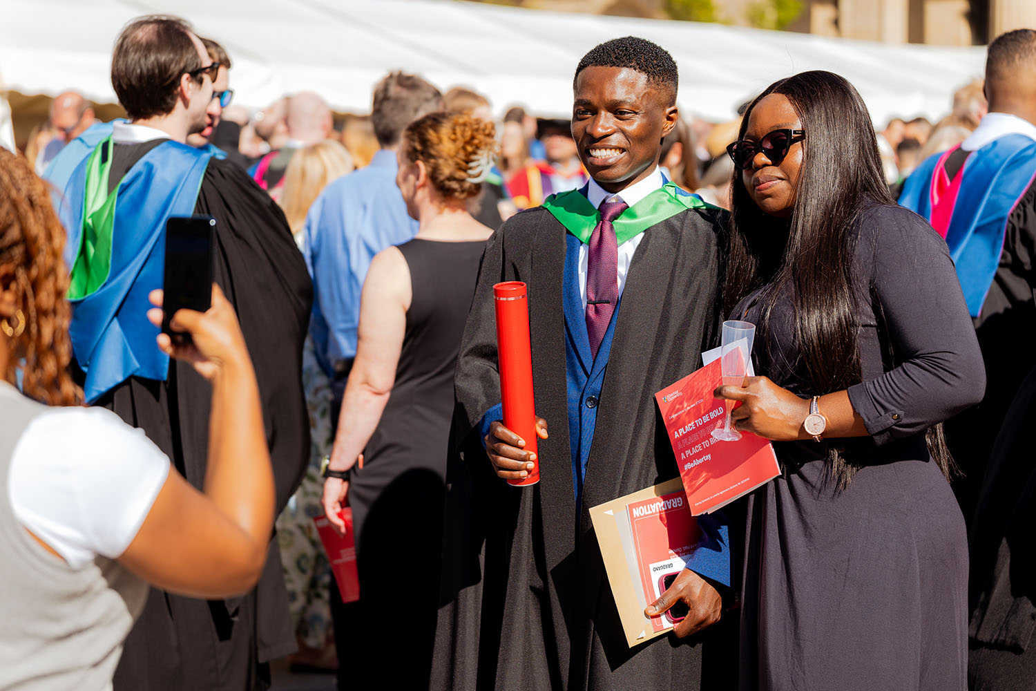 Student graduating outside Caird Hall