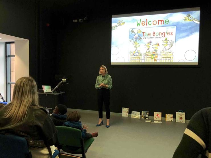 Cab Sec for Education Jenny Gilruth presenting The Bongles in front of a screen at Abertay cyberQuarter